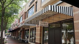 15999 City Walk building with offices over retail at Sugar Land Town Square