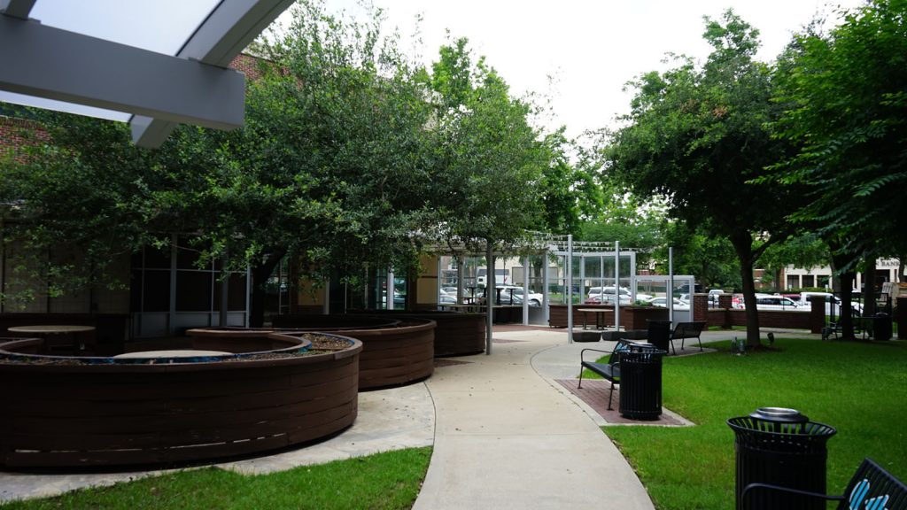 The Texas Drive Building |  Courtyard view of this office over retail property in Sugar Land Town Square.